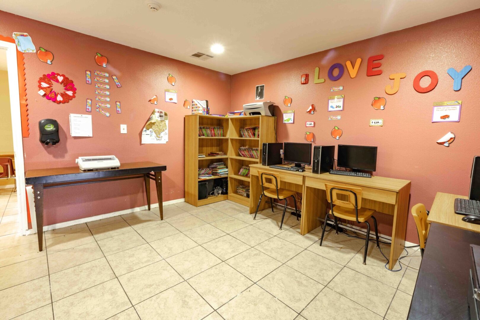 A cozy computer and music corner in a warm, inviting room.